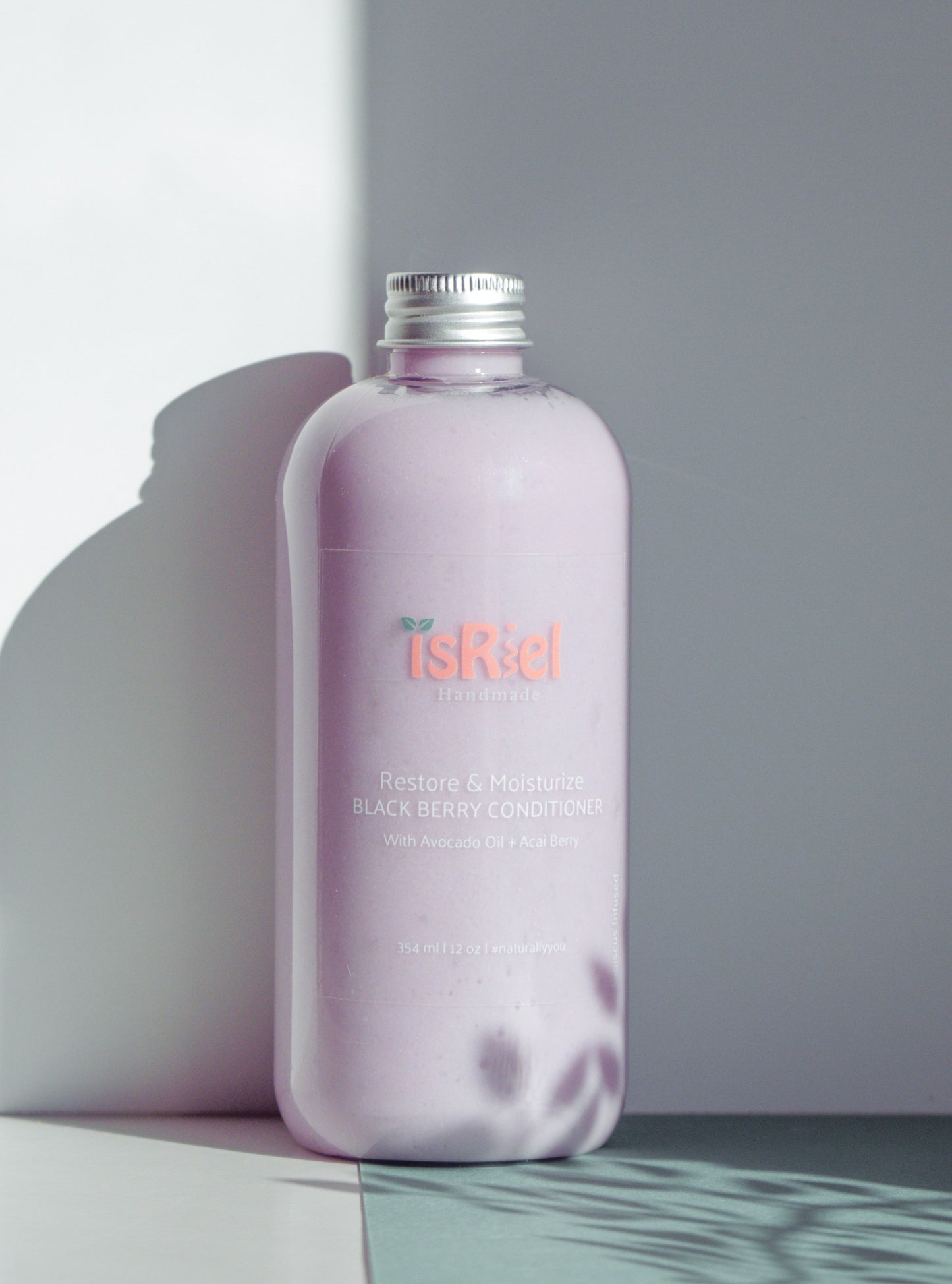 Shampoing et revitalisant aux baies noires